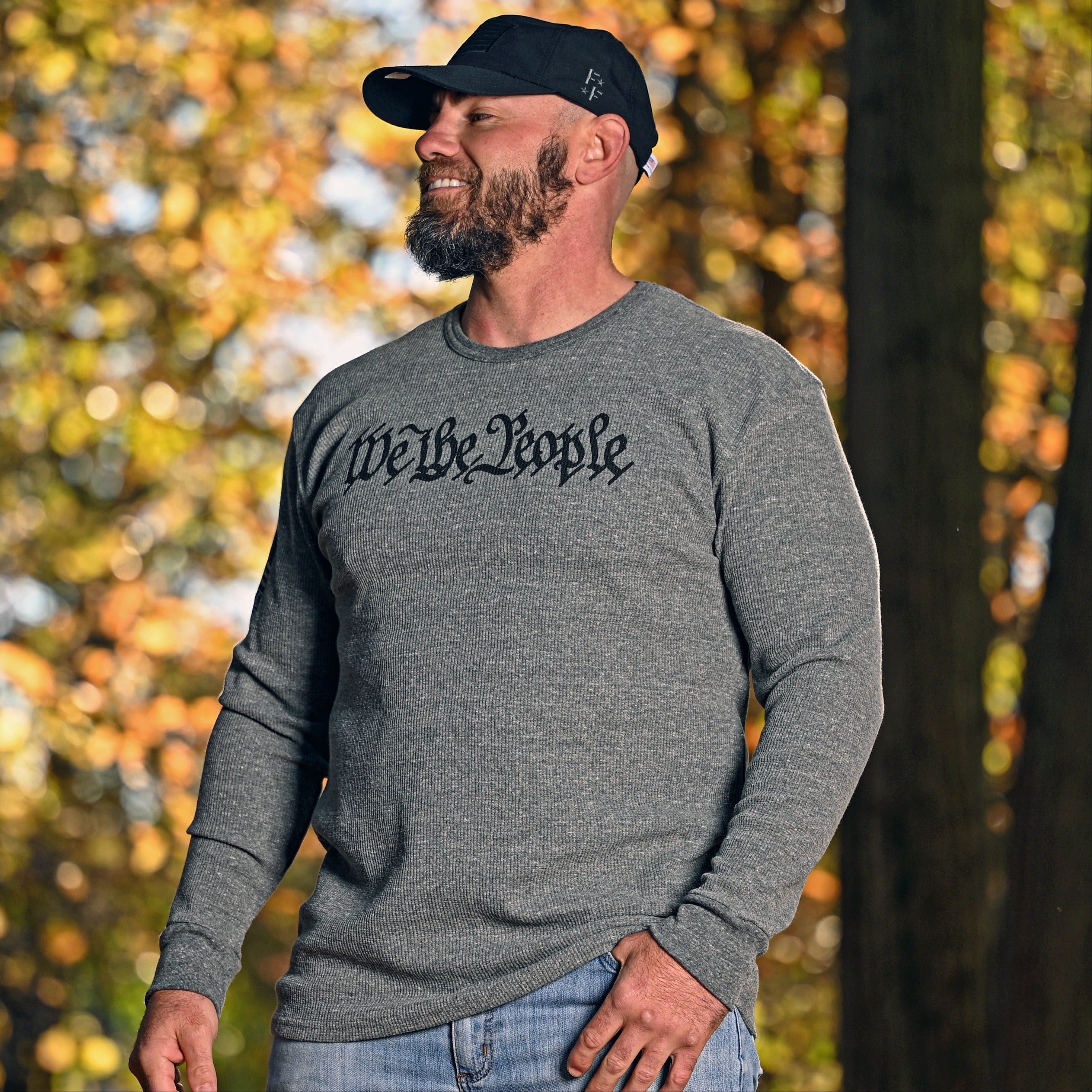 Man wearing the We The People Patriotic Long Sleeve Thermal in a woodland setting