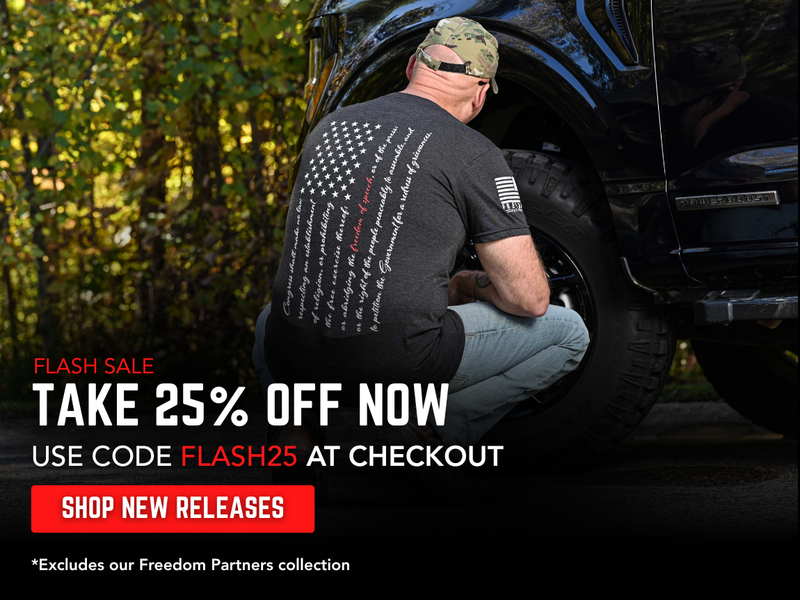 Man working on a vehicle with a promotion to save 25%