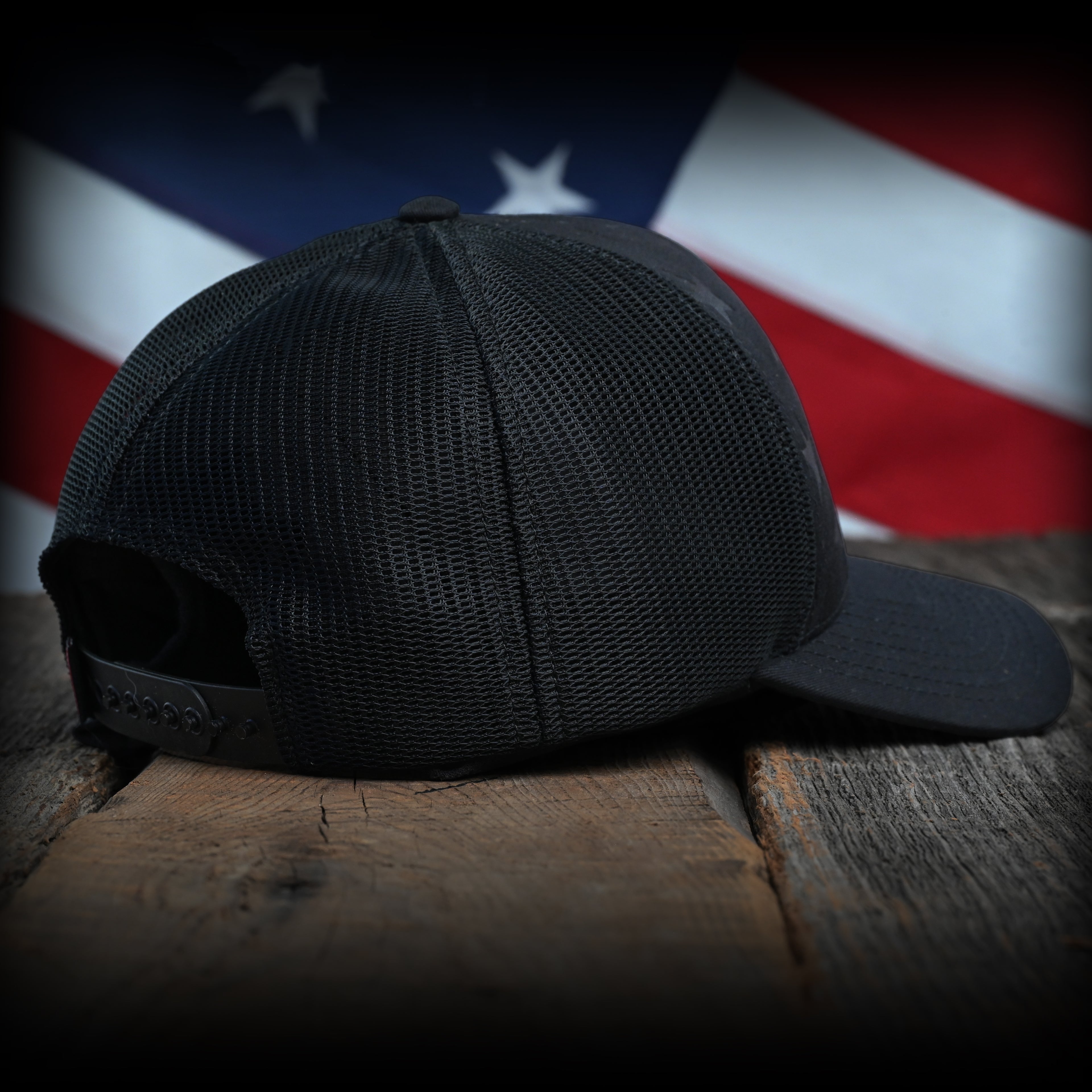 Blacked Out Debossed American Flag Trucker Hat