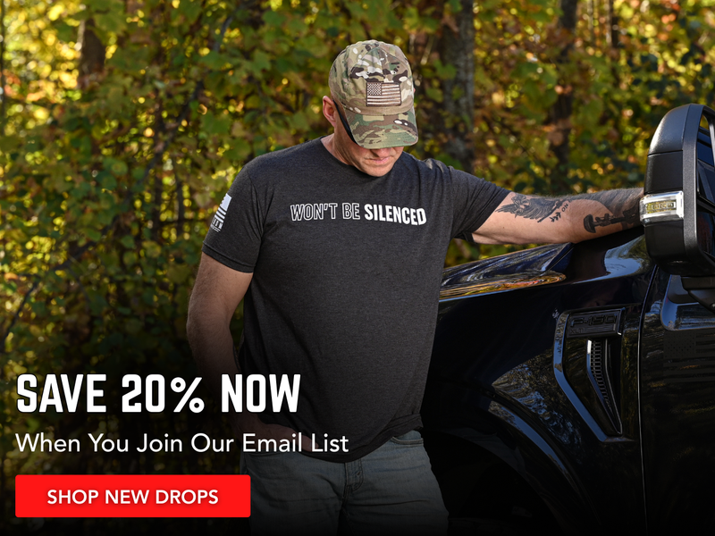 Man wearing a patriotic "Won't Be Silenced" black t-shirt and promotion to save 20% with email signup.