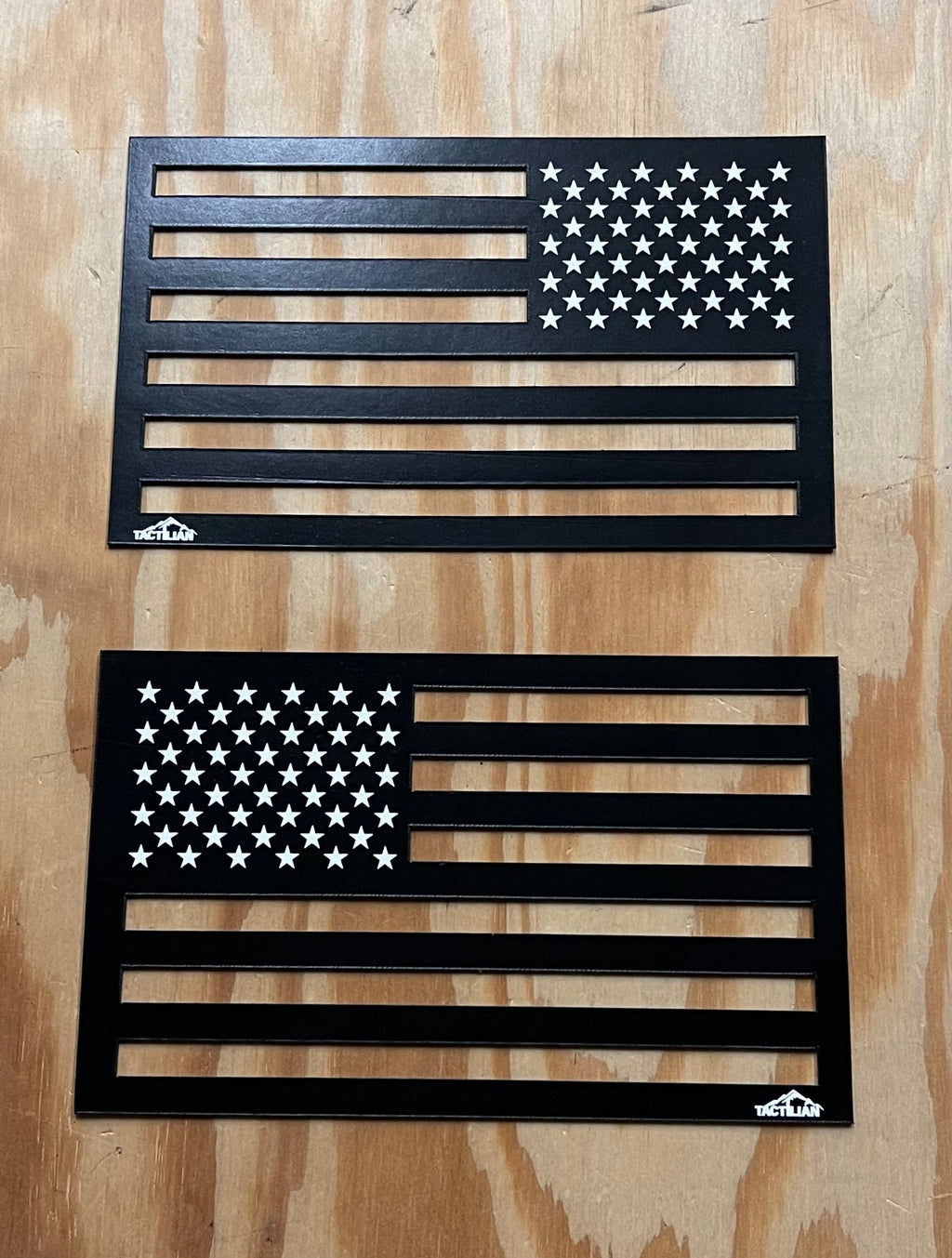 Close-up view of the set of black American flag vehicle magnets