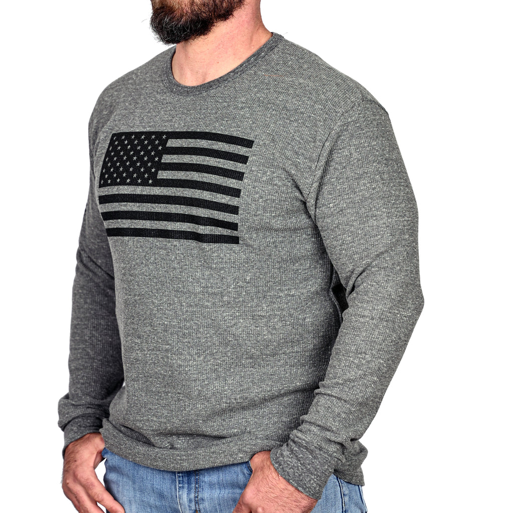 Model wearing the long sleeve American Flag patriotic thermal from the front left
