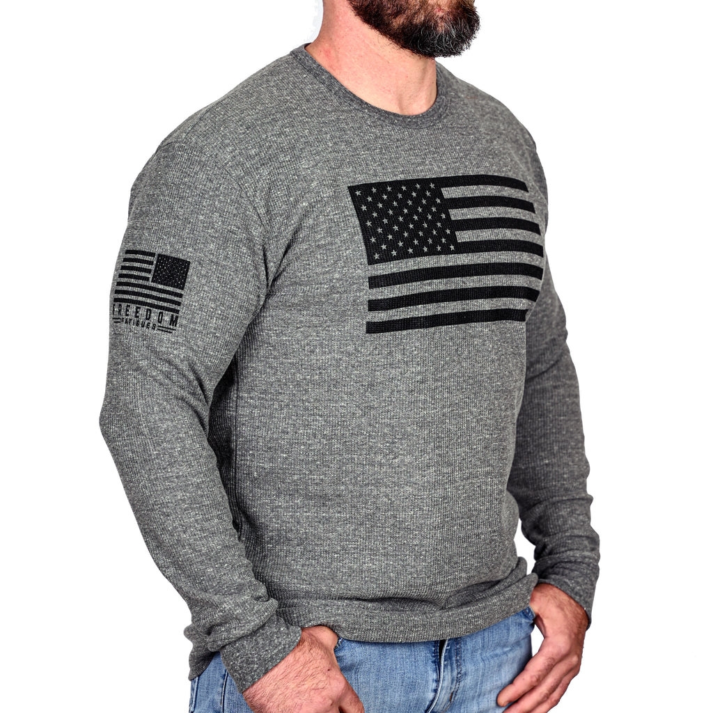 Model wearing the long sleeve American Flag patriotic thermal from the front right