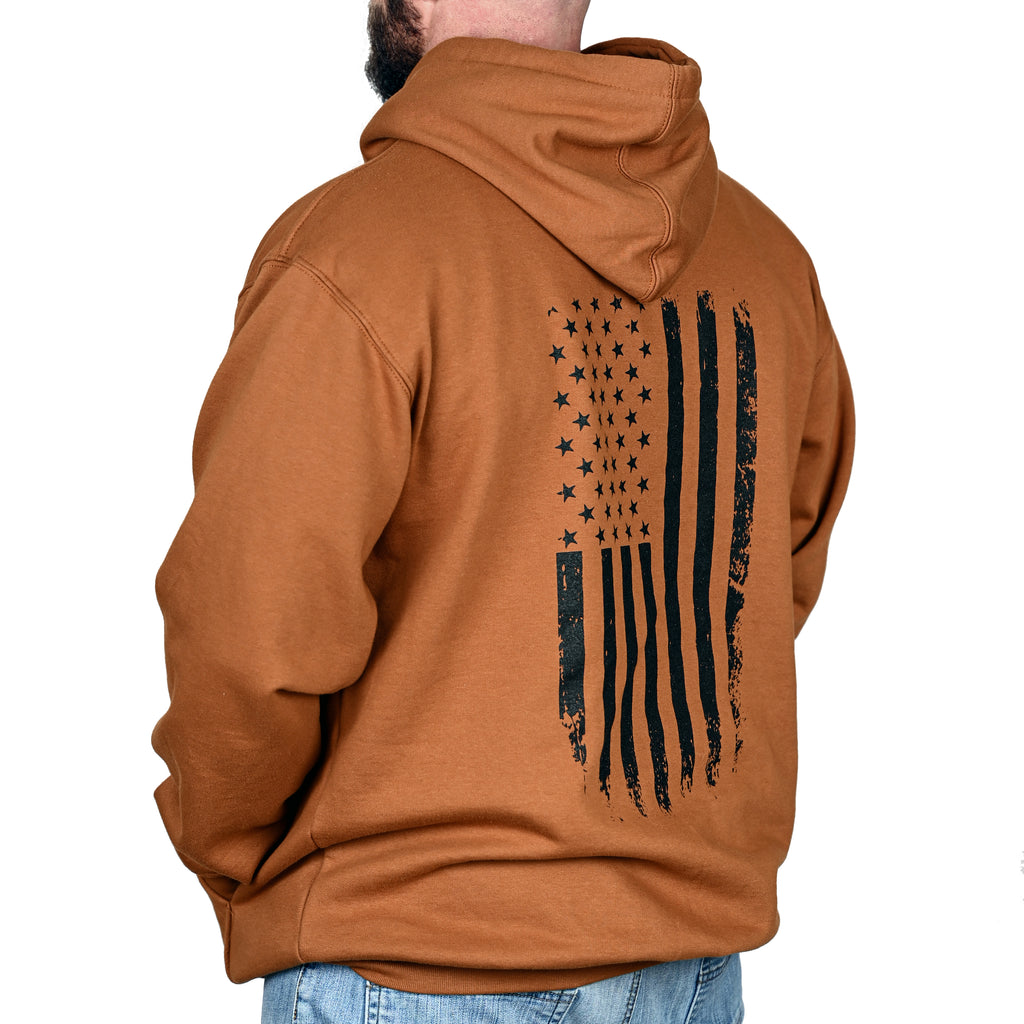 Caramel brown hoodie with an American flag design on the back, worn by a male model
