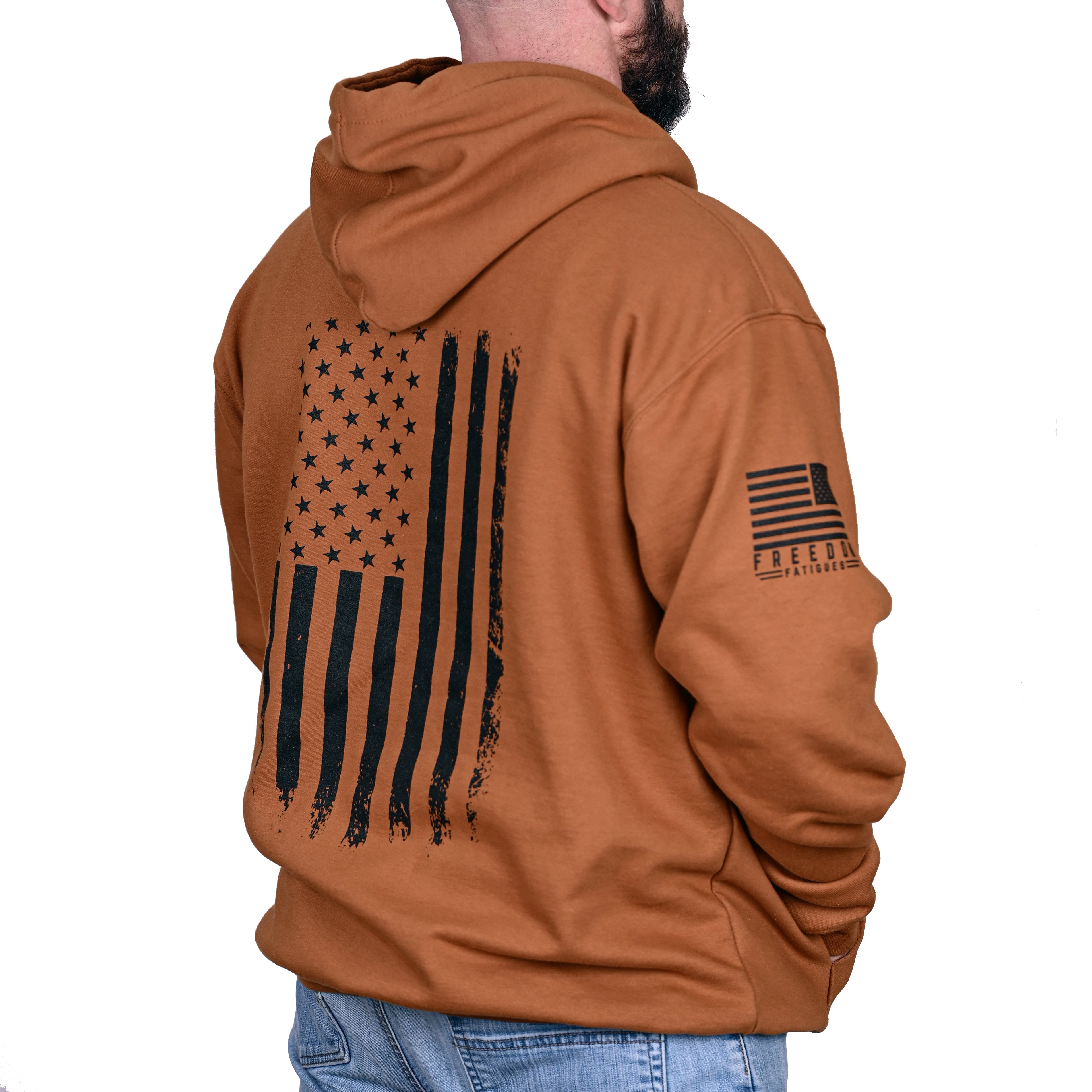 Caramel brown hoodie with American flag design on the back and sleeve, worn by a male model