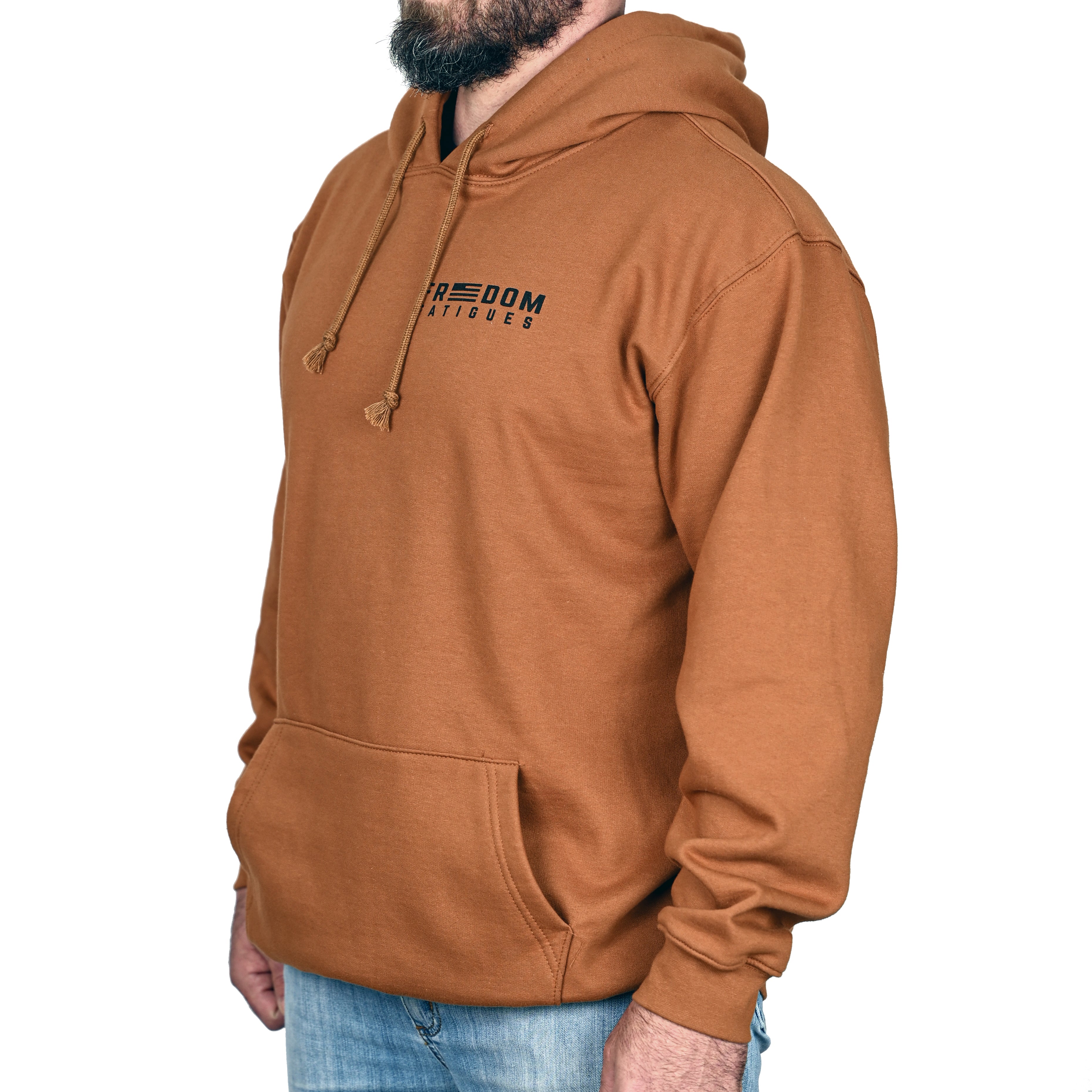 A caramel brown patriotic hoodie with a logo on the chest against worn by a male model