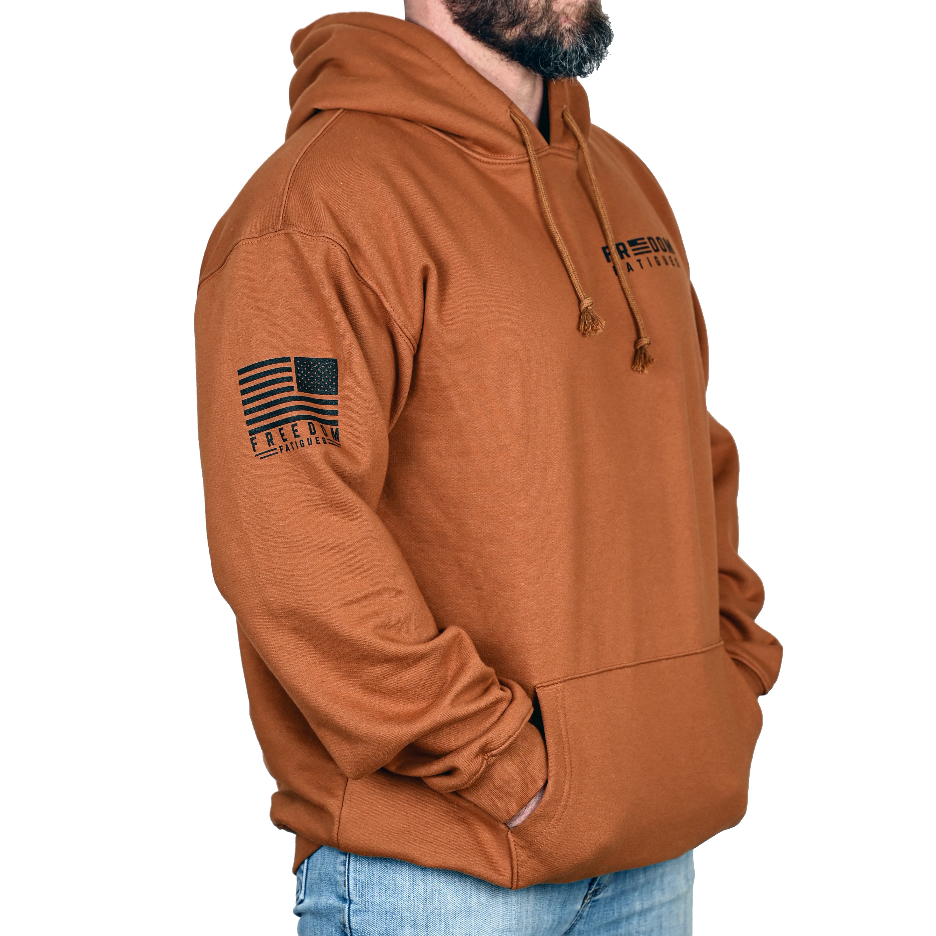 Caramel brown hoodie with an American flag on the sleeve and brand logo on chest, worn by a male model