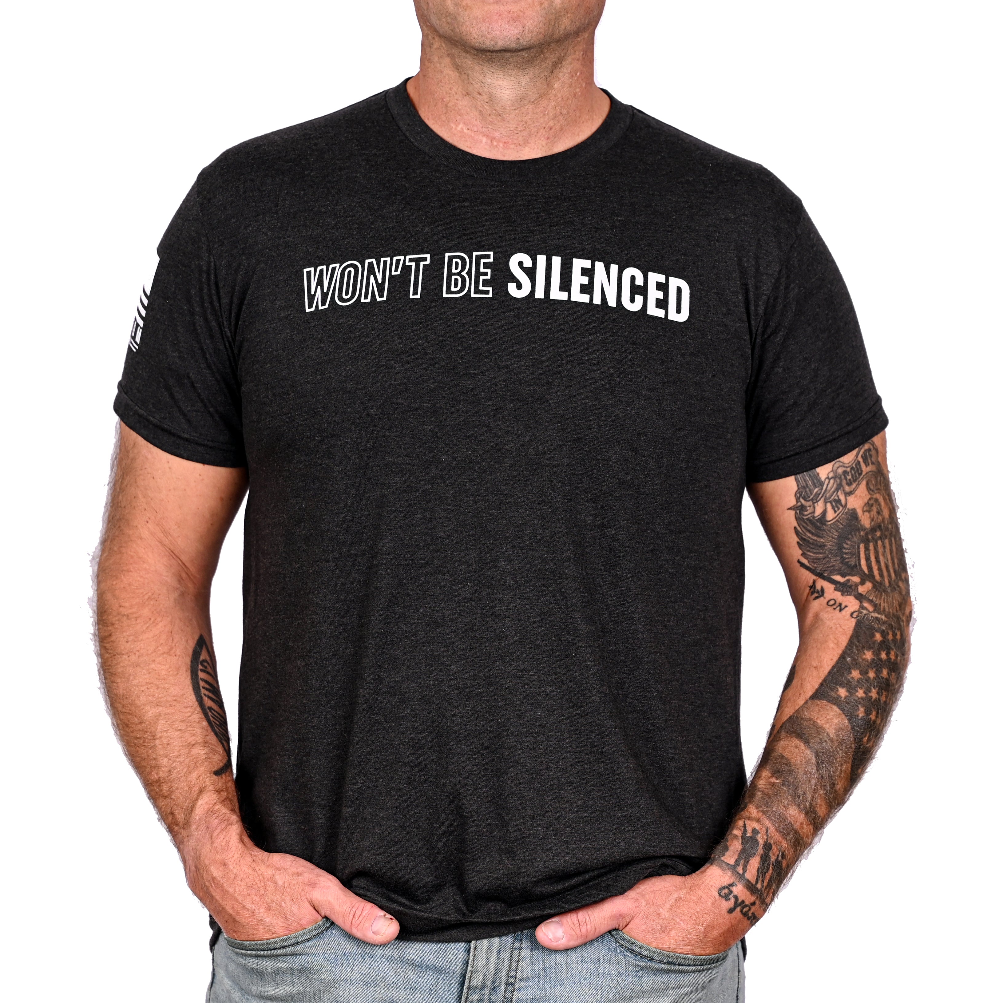 Man wearing a black patriotic t-shirt with 'WON'T BE SILENCED' text on the front