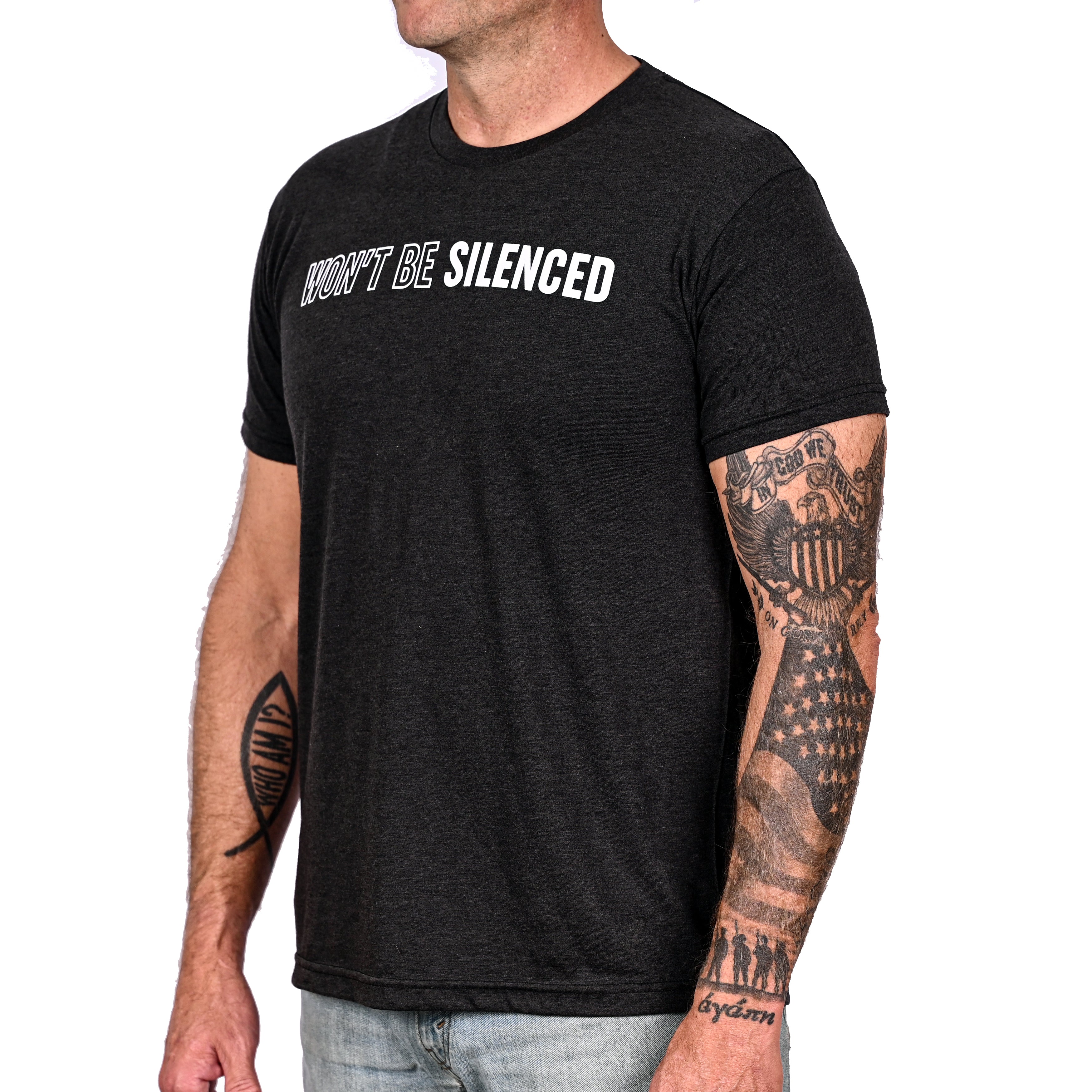 Patriotic black t-shirt with 'WON'T BE SILENCED' text worn by a man.