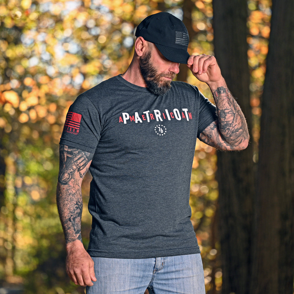 Man wearing the American Patriot T-shirt in a woodland setting