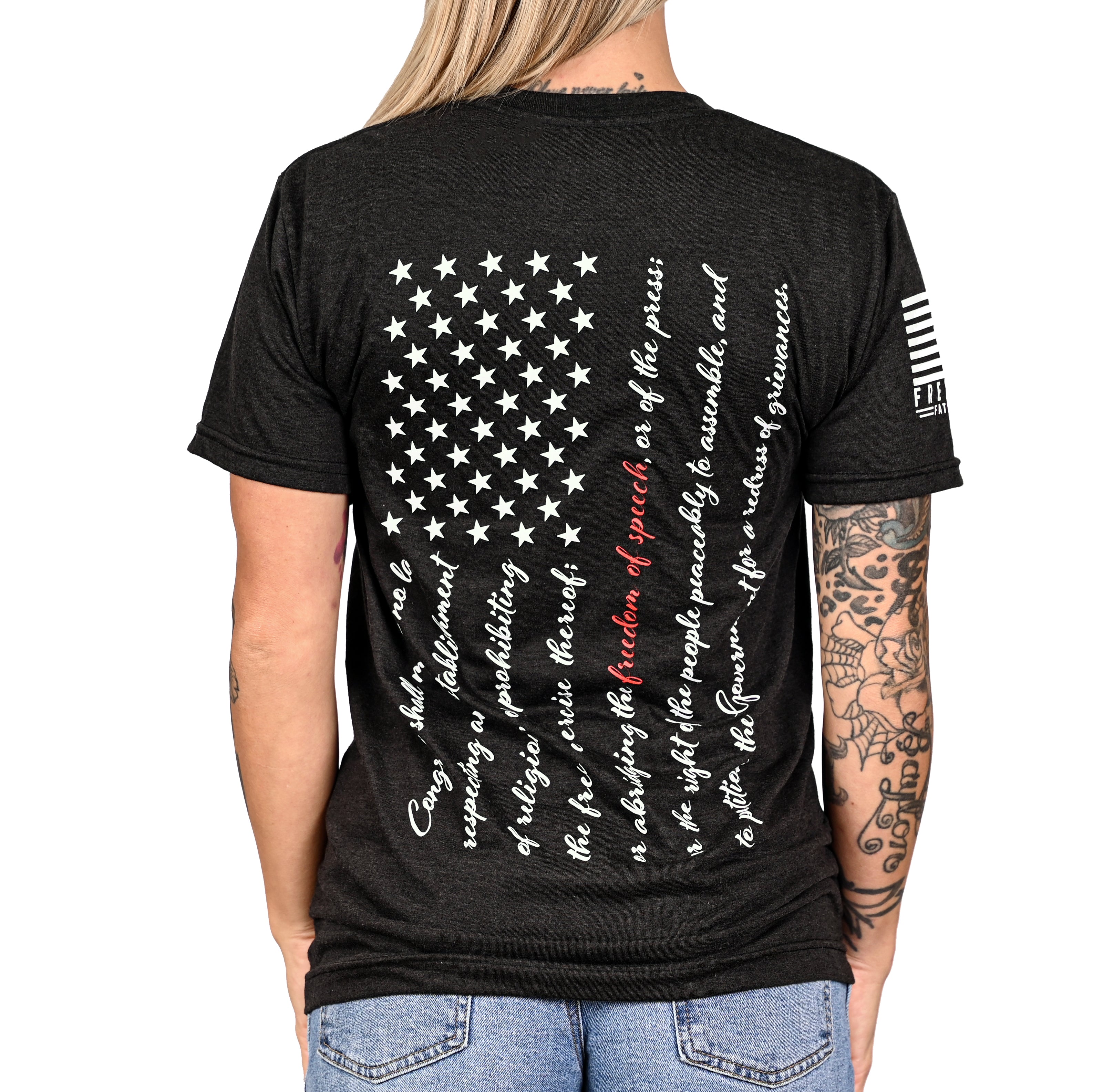Patriotic black t-shirt with an American flag composed of the first amendment on the back and worn by a female model.