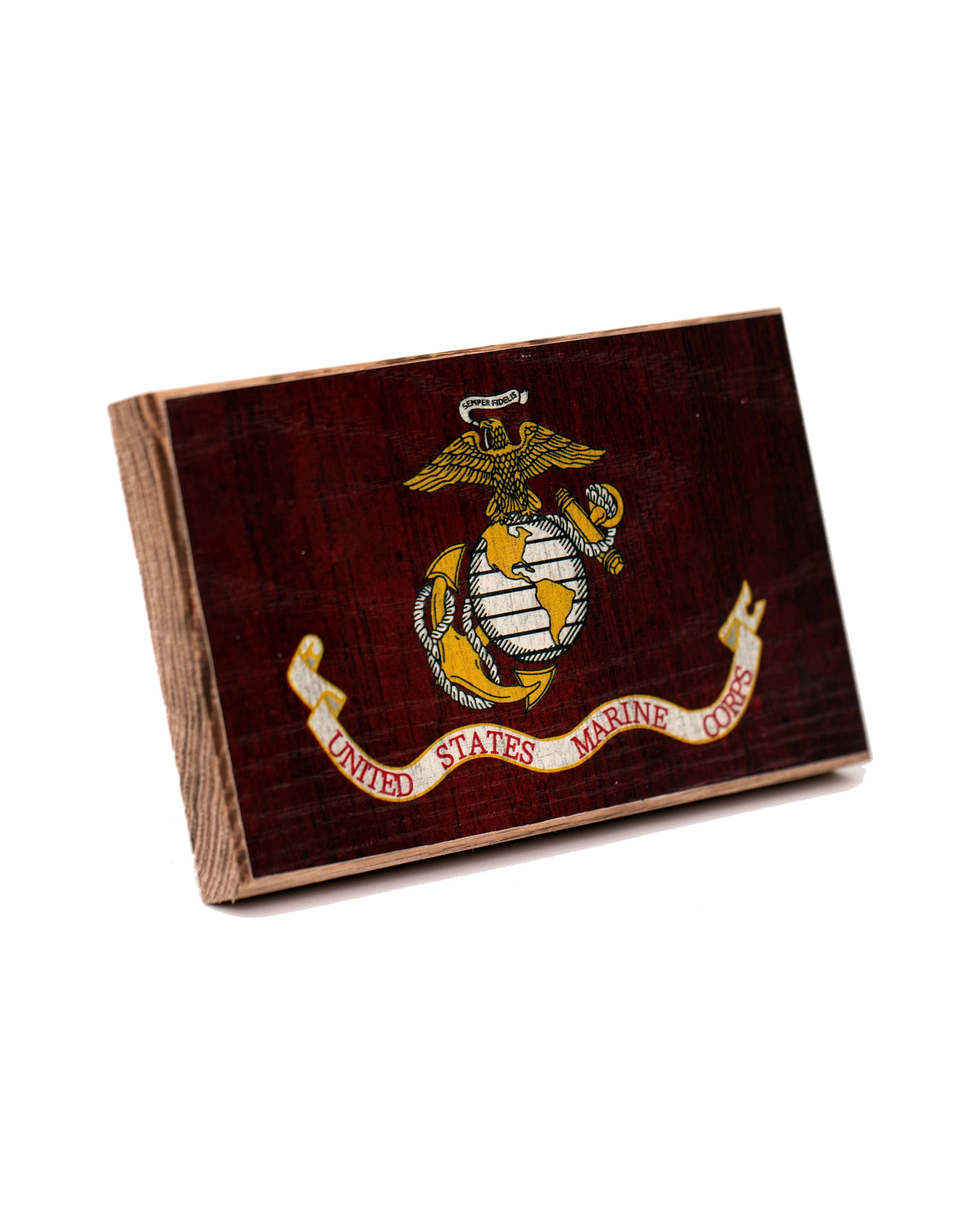 Wooden box with U.S. Marine Corps emblem on a white background